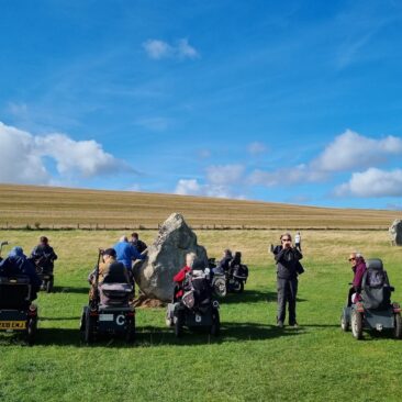 Disabled-Ramblers-Avebury-Admiring-the-stones-c-366×366